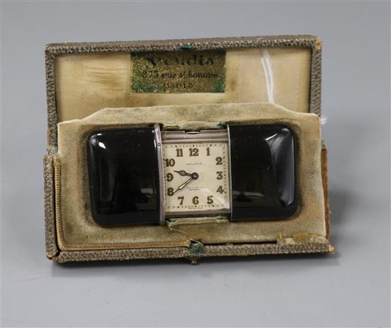An early 20th century silver and enamel cased Movado travelling timepiece, in original box, 7cm.